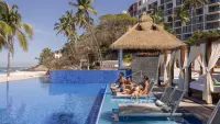 PVRIF-P0607-Family-By-Pool-Side-Facing-Ocean.16x9