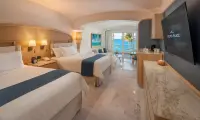 large_elegant_luxury_ocean_view_suite_cozumel_palace