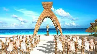 Dreams Resorts beachfront ceremony venue for all-inclusive destination weddings in Mexico